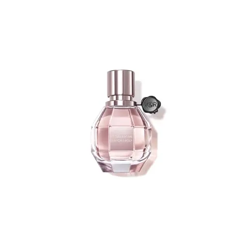 Viktor&Rolf Flowerbomb perfume bottle shaped like a grenade with a faceted pink gem.