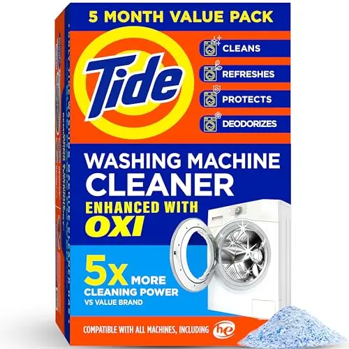 Tide Washing Machine Cleaner powder packet on a clean washing machine drum