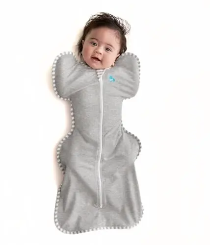 Love to Dream Swaddle UP sleep sack in gray on a baby