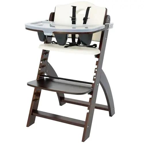 Abiie Beyond Junior wooden high chair with tray in a natural wood finish