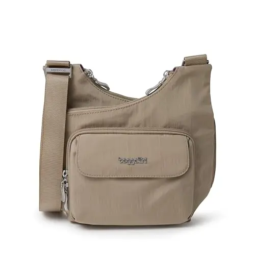 Baggallini criss cross handbag in a beach pattern, showing crossbody strap and multiple compartments