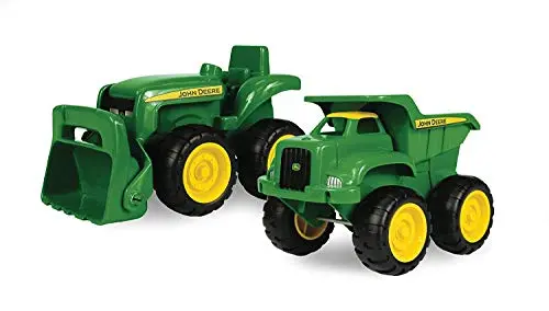 TOMY John Deere toy dump truck and tractor set on grass
