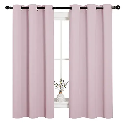 NICETOWN baby pink thermal insulated blackout curtains with grommet top.