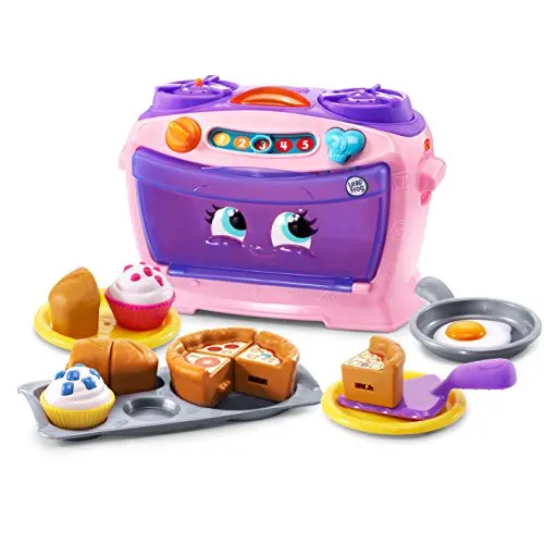 Pink LeapFrog Number Lovin' Oven toy with food pieces on a table