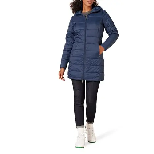 Amazon Essentials women's simple, quilted puffer jacket in navy blue, packed into a small drawstring bag.