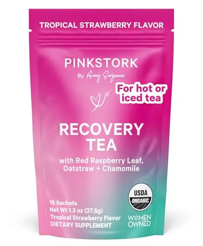 Pink Stork Postpartum Recovery Tea box with strawberry design and tea sachets.