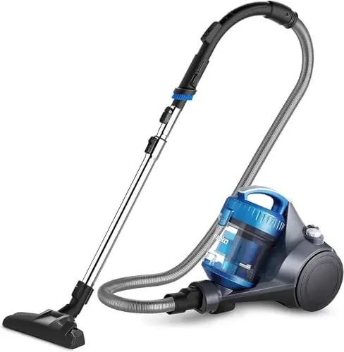 Eureka WhirlWind blue canister vacuum cleaner next to a tile floor