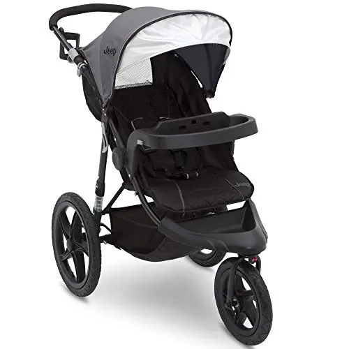 Jeep Classic jogging stroller in Grey color on a mixed terrain path