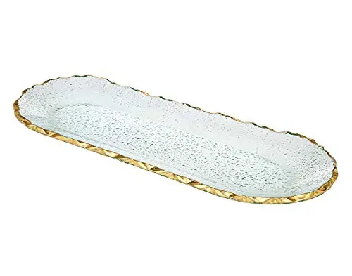 Godinger Harper Oval Serving Tray with gold trim on a table