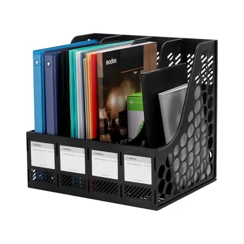 Comix black plastic 4-compartment magazine file holder rack on a desktop
