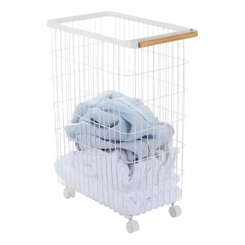 Yamazaki white wire rolling laundry hamper with wooden handle accents.