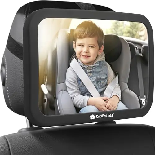 KeaBabies matte black baby car mirror with reinforced straps on a headrest