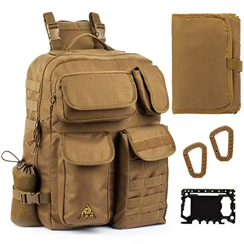 T.O.M HORIZONS khaki sling diaper bag worn over one shoulder, showing front pouches.
