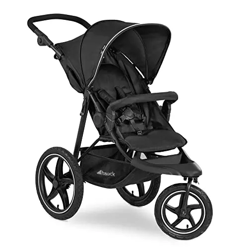 Hauck Runner 2 all-terrain jogging stroller in black on a dirt and gravel path