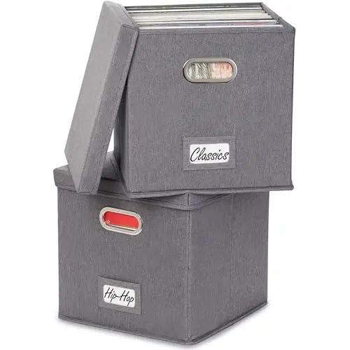 Two stylish grey linen fabric storage boxes for vinyl records with lids and metal handles.