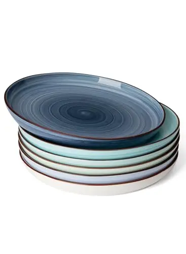 Sweese blue gradient porcelain dinner plates stacked on a kitchen counter