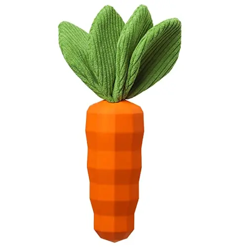 Orange carrot-shaped dog chew toy with green plush leaves