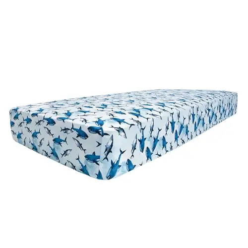 Posh Peanut Crib Sheets in a floral pattern on a baby crib
