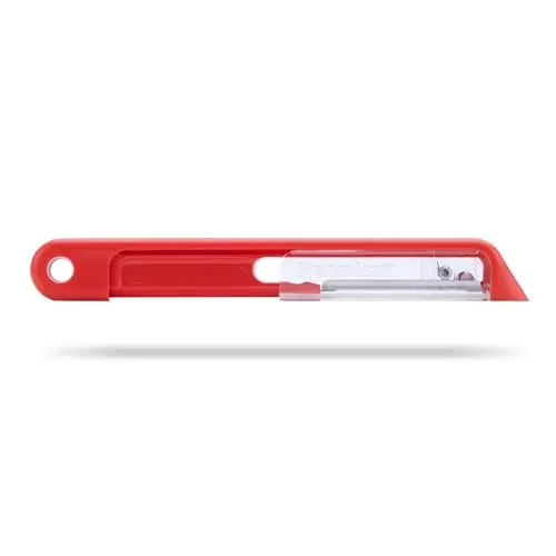 Dreamfarm Sharple vegetable peeler with red handle and sliding safety cover