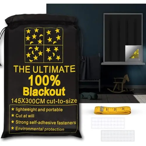 ULIGOOD portable blackout shade being cut to size with adhesive tape