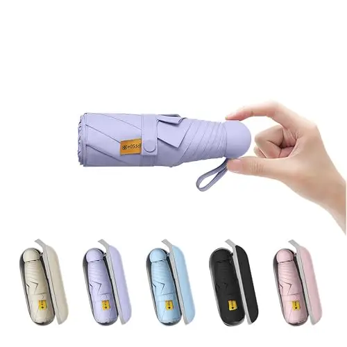 BAODINI tiny pocket umbrella with case, demonstrating its small folded size.