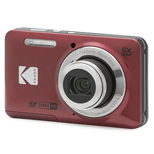 KODAK red digital camera with 5x optical zoom capturing distant travel scenes