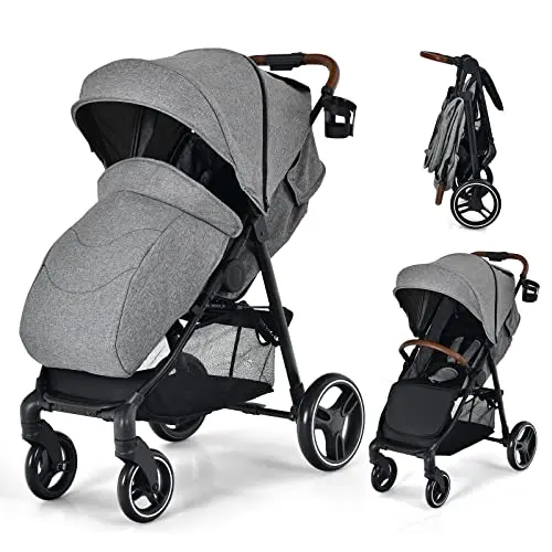 HONEY JOY high-view baby stroller with foot cover on a sidewalk