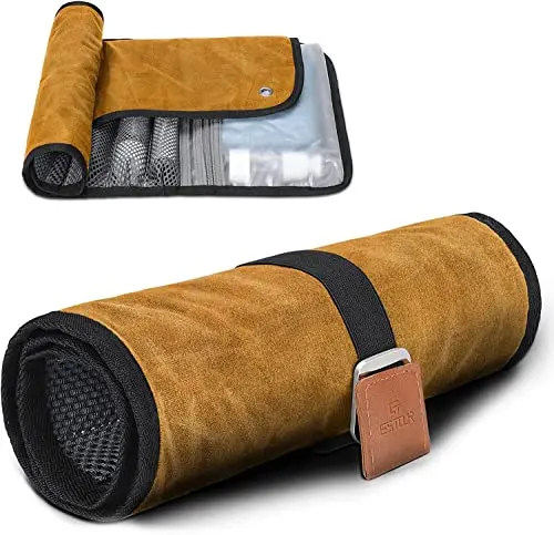 Khaki yellow waxed canvas toiletry bag rolled up and secured