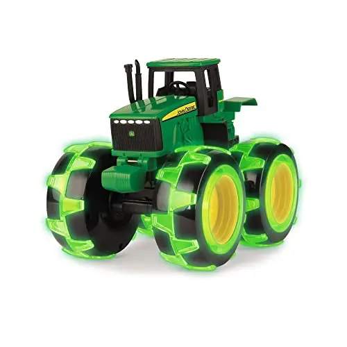 Green John Deere tractor monster truck toy with large wheels and light-up feature