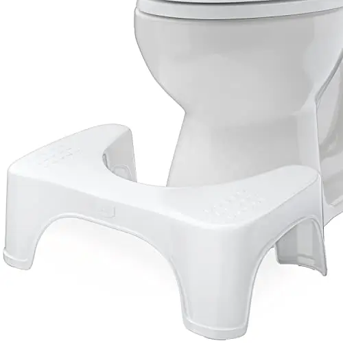 Squatty Potty Standard 7-inch toilet stool with night light in white, showing illuminated feature.