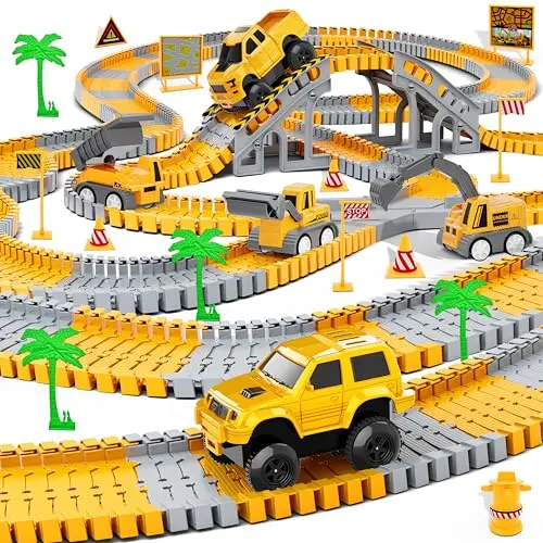 Flexible orange race track pieces with construction trucks and cars on a built track