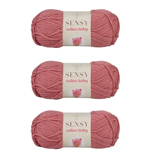 Three skeins of Sensy Softee Baby Yarn in a beautiful dusty rose color.