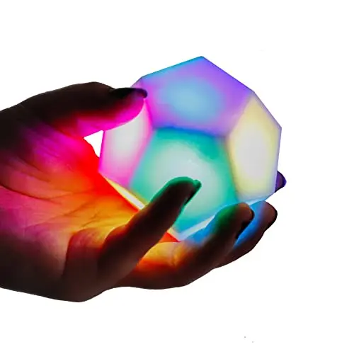 A handheld, cube-shaped electronic toy with multi-colored LED lights that pulse and change patterns.