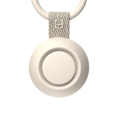 Hatch Go portable sound machine in putty color with a clip