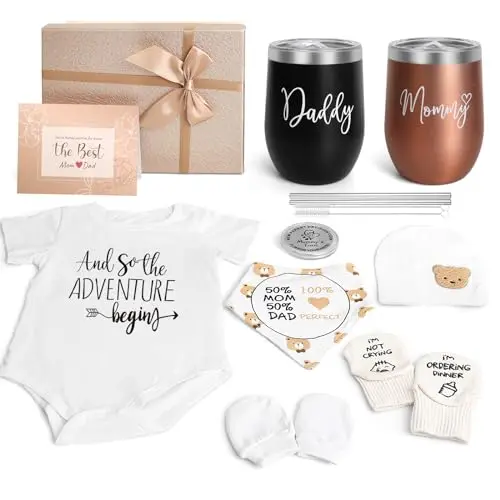 New parents gift basket containing stainless steel tumblers, baby onesie, bib, mittens, socks, hat, and a decision coin