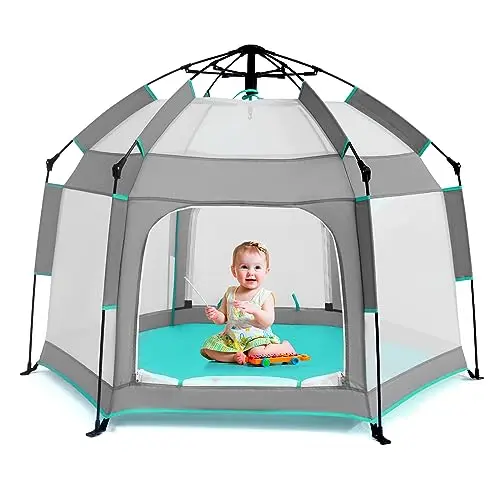 Bend River grey baby playpen with canopy used as a beach tent