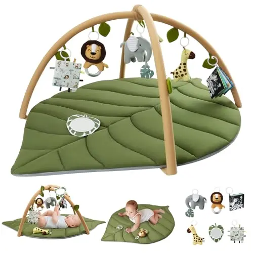 Extra-large leaf-shaped baby play mat with safari animal toys on green background