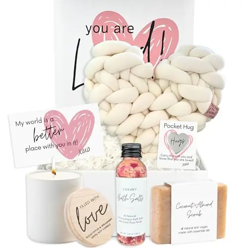 Gift box set containing a heart pillow, candle, soap, and bath salts