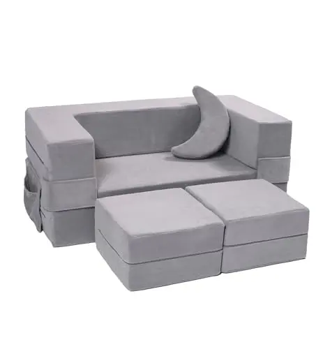 Grey Elftopia modular sofa folded out into a flat bed on a playroom floor.