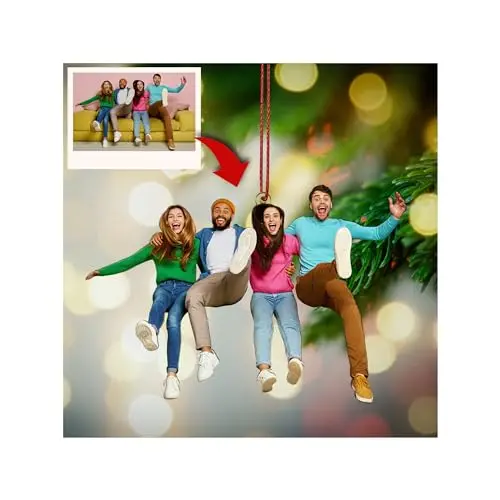 A custom acrylic Christmas ornament displaying a family photo on both sides, hanging from a red ribbon.