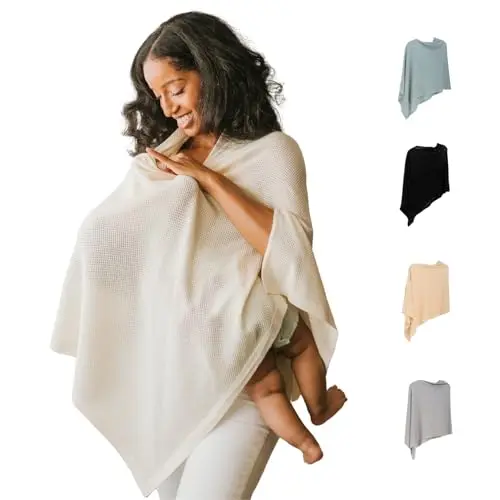 Gold Mamas knitted nursing poncho in Sand color, styled as a shawl