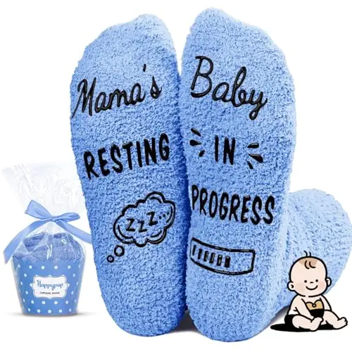 Blue fuzzy pregnancy socks with non-slip soles and a funny 'Mama's RESTING, Baby IN PROGRESS' message