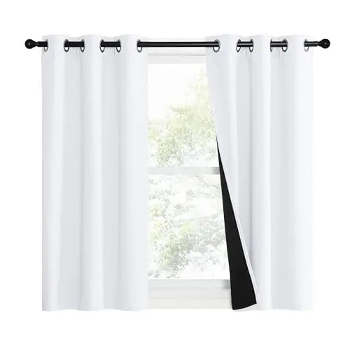 NICETOWN Pure White Blackout Curtains hanging on a kitchen window