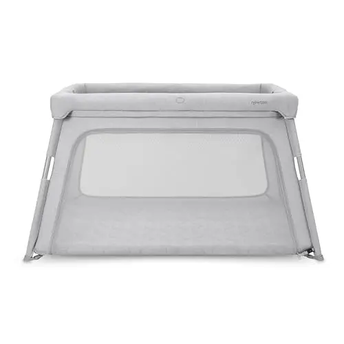 Newton Baby Deluxe Travel Crib set up, showing large play area and breathable mesh
