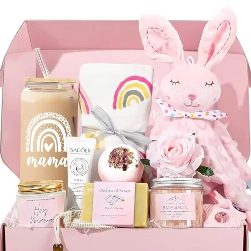 Pink gift basket with bunny lovey, swaddle, Mama glass, lavender candle, bath salts, and mom care products
