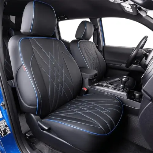 EKR Tacoma rear seat covers in black with blue trim, showing custom fit on a truck bench.