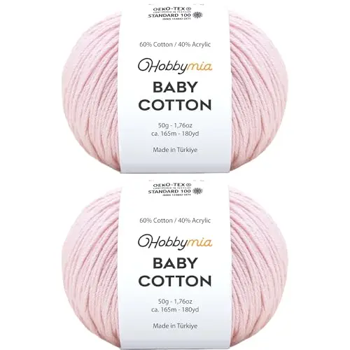 Two balls of HobbyMia Baby Cotton Yarn in a soft light pink color.