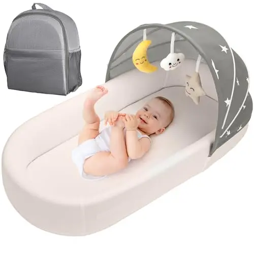 BNAKKON Portable Baby Bassinet with hanging toys and detachable canopy