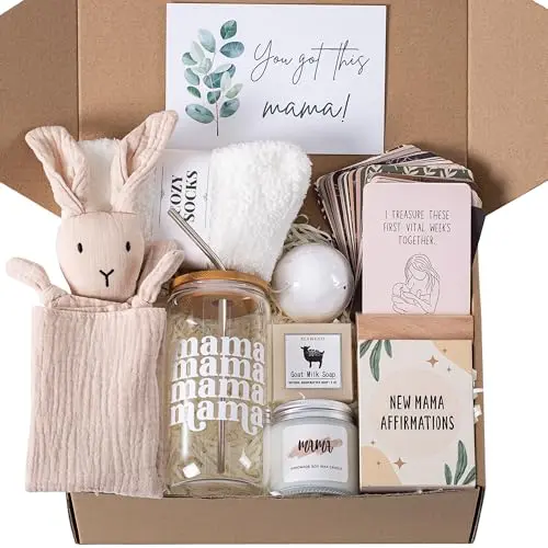 New Mom Care Package gift box with MAMA cup, candle, socks, bath bomb, soap, affirmation cards, and a bunny lovey.