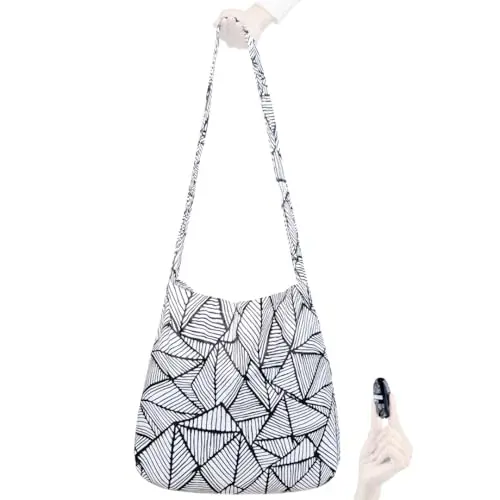 Nanobag Sling unfolded, worn as a crossbody bag, showing its spacious interior
